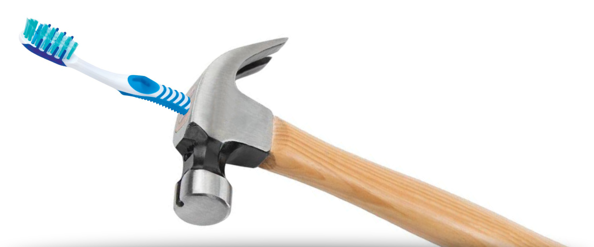 hammer with toothbrush